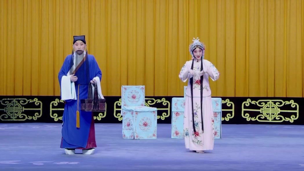 京剧《御碑亭》剧中老生与青衣对谈场面（央视《中国京剧像音像集萃》截帧）